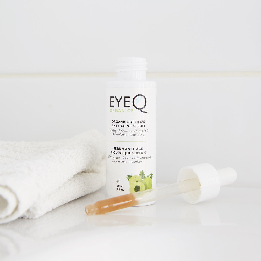 EQO Super C’s Anti-Aging Serum bottle displayed with dropper in use. The dropper was selected to assist user in application of pearl size drops. 1-2 to eye area, 2-3 to whole face. Follow with EQO Kakadu Plum Firming Eye Cream for best results.