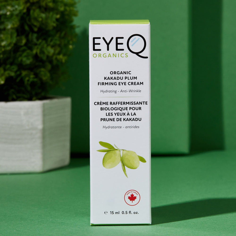 EQO Kakadu Plum Firming Eye Cream 15ml bottle sealed in EQO white box packing on green background, 4.5cmx4.5cmx12cm, with symbols indicating product is Made in Canada.